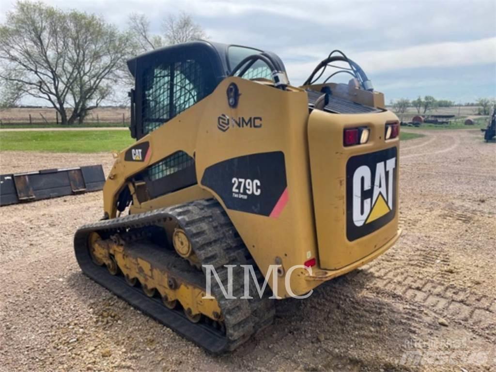 CAT 279C Mini Pale Gommate
