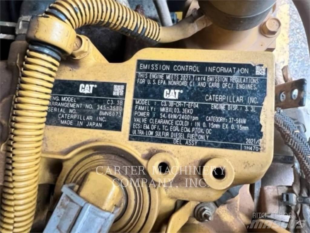 CAT 279D Mini Pale Gommate