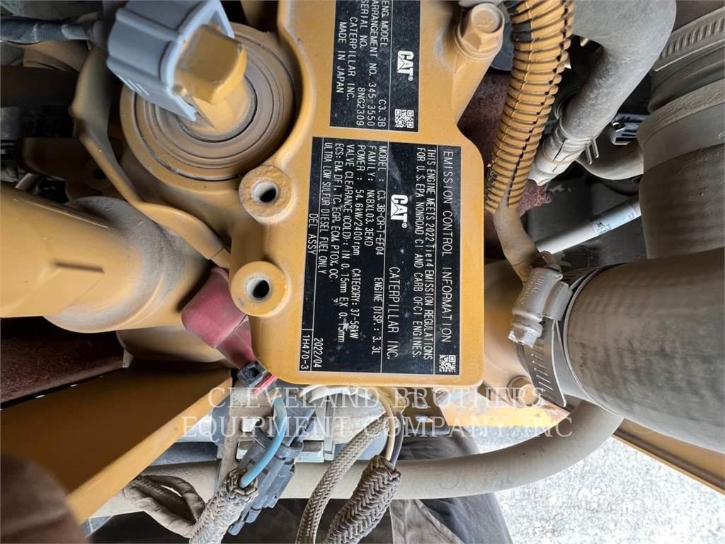 CAT 279D Mini Pale Gommate