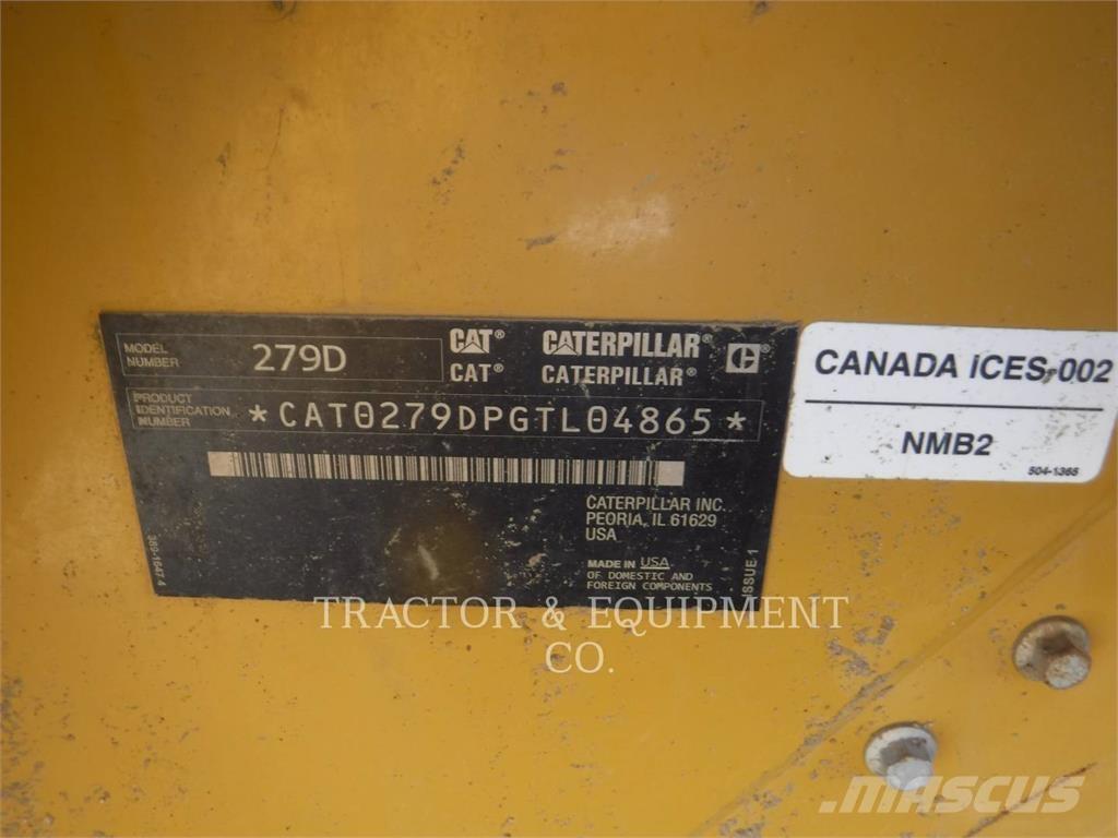 CAT 279D Mini Pale Gommate
