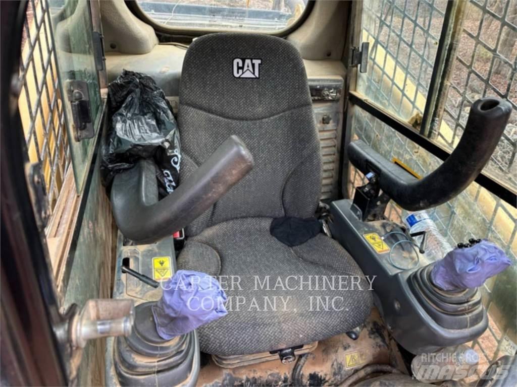 CAT 289D Mini Pale Gommate