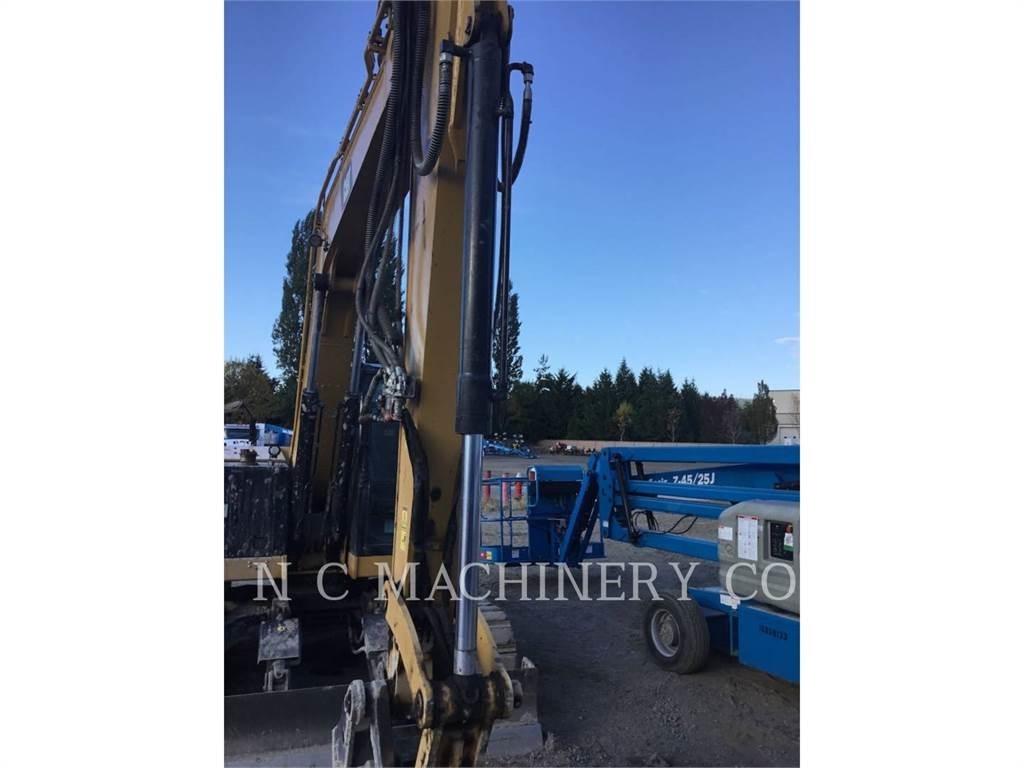 CAT 310 Escavatori cingolati