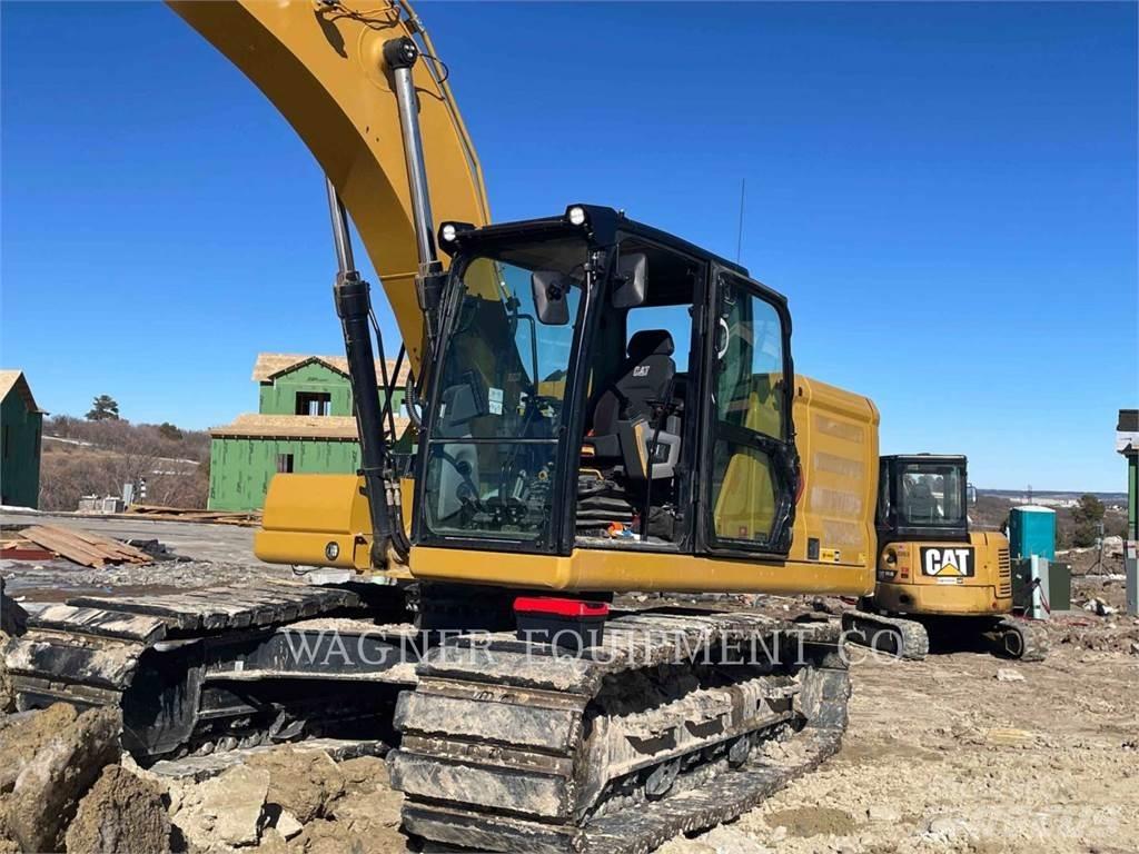 CAT 323 Escavatori cingolati