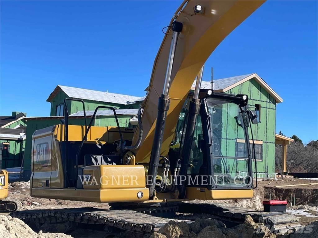 CAT 323 Escavatori cingolati