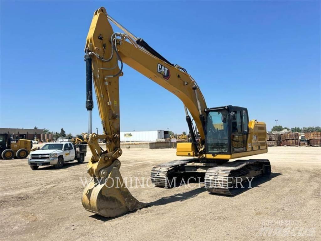 CAT 323 Escavatori cingolati