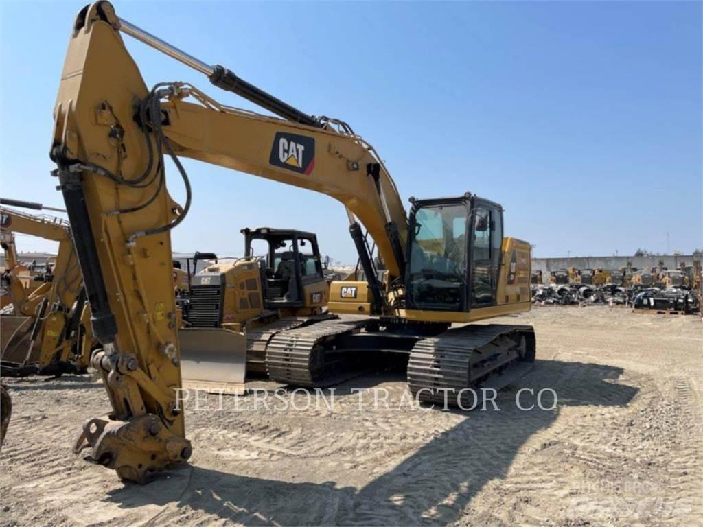 CAT 323 Escavatori cingolati