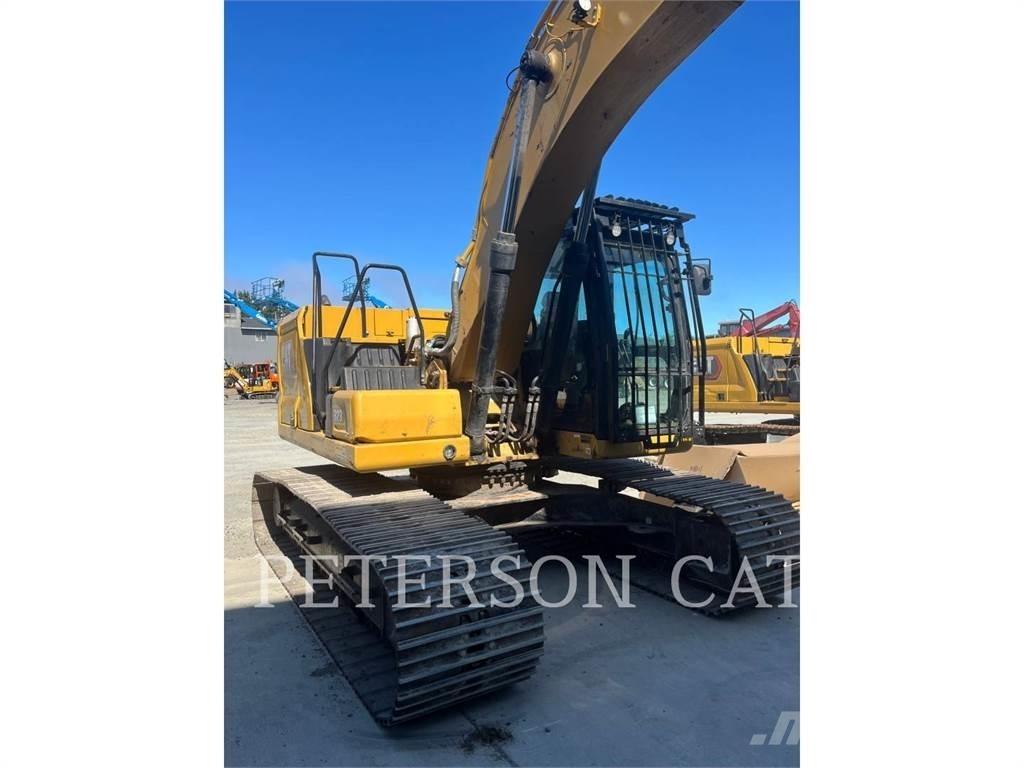 CAT 323 Escavatori cingolati