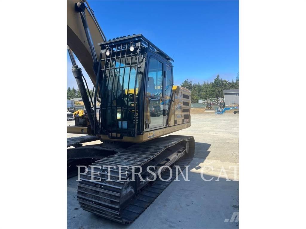 CAT 323 Escavatori cingolati