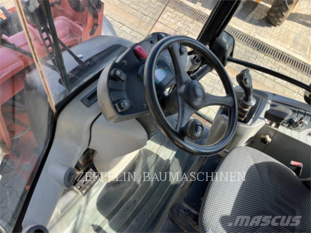 CAT 906H Pale gommate