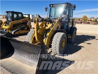 CAT 906M Pale gommate