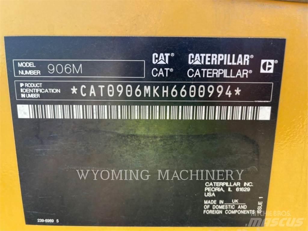 CAT 906M Pale gommate
