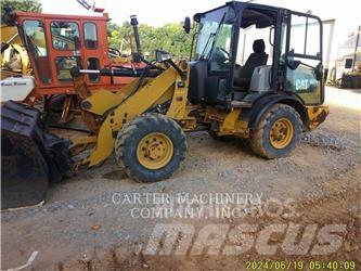 CAT 906M Pale gommate