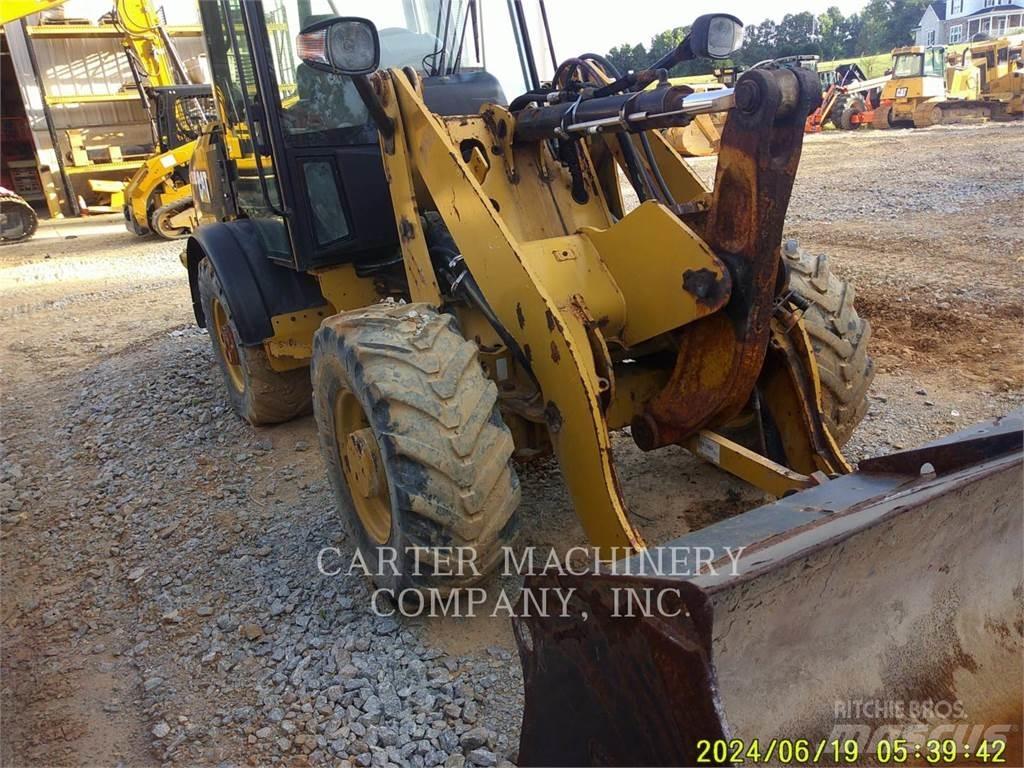 CAT 906M Pale gommate