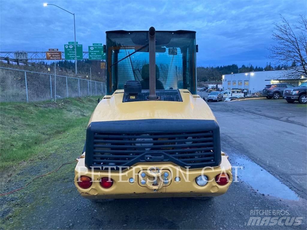 CAT 906M Pale gommate
