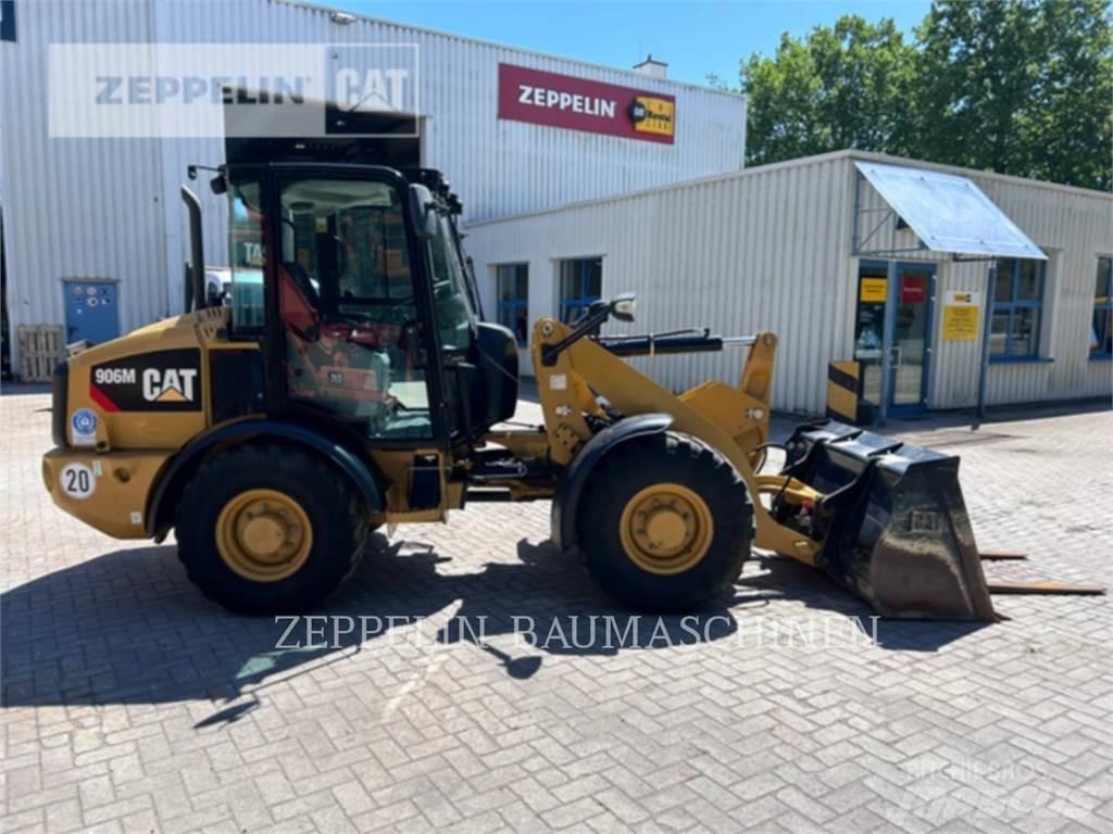 CAT 906M Pale gommate