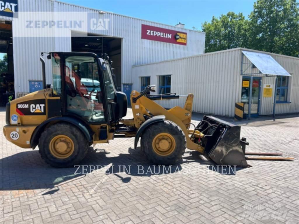 CAT 906M Pale gommate