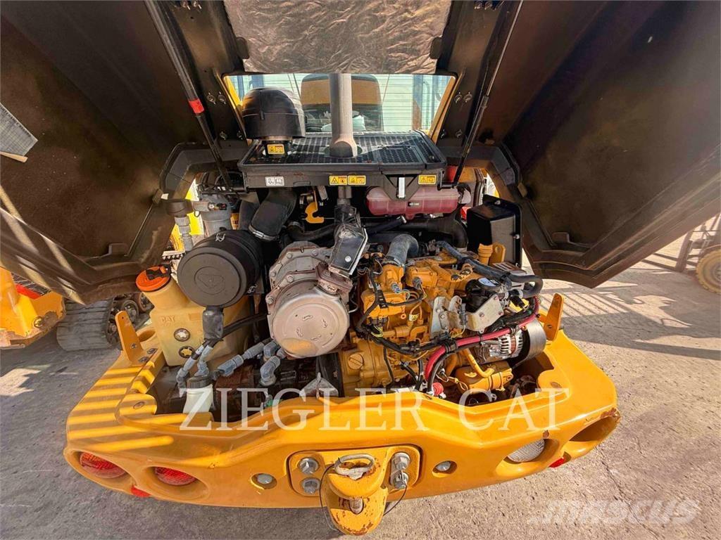 CAT 906M Pale gommate