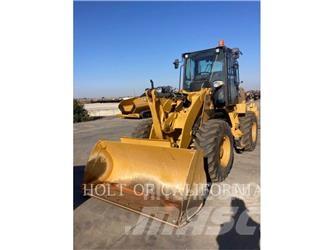 CAT 910M Pale gommate