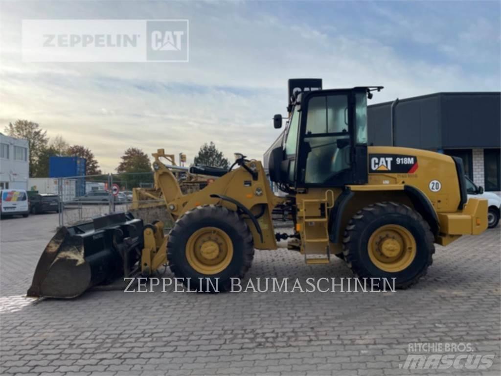 CAT 918M Pale gommate