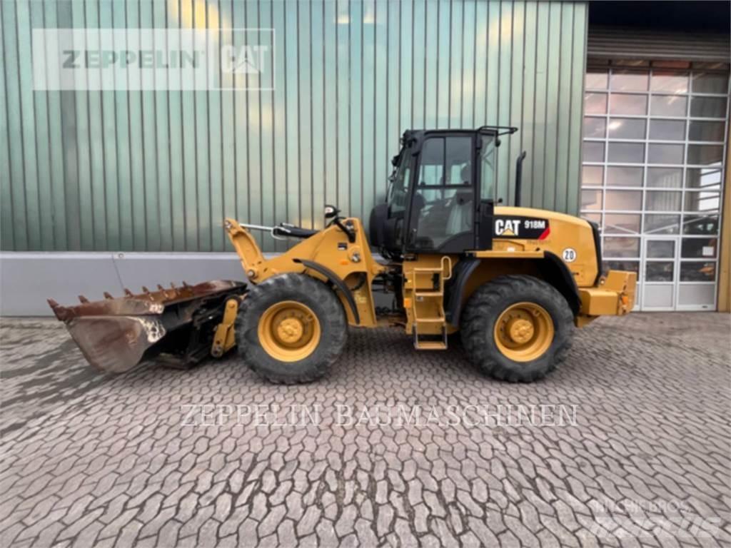 CAT 918M Pale gommate