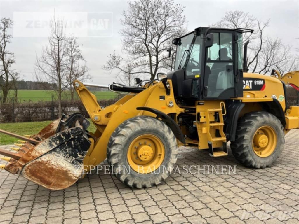 CAT 918M Pale gommate