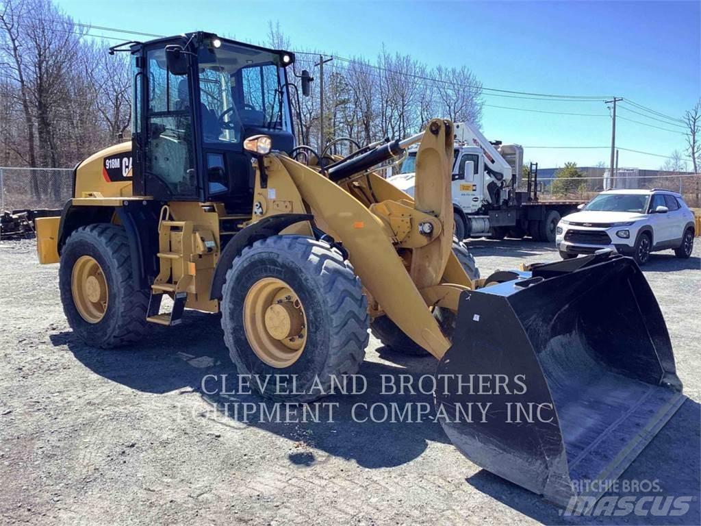 CAT 918M Pale gommate
