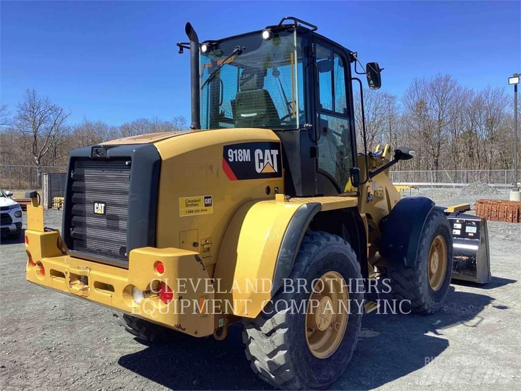 CAT 918M Pale gommate