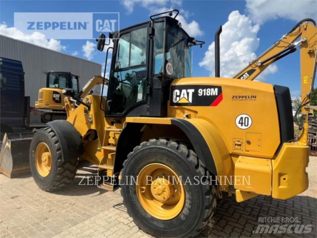 CAT 918M Pale gommate