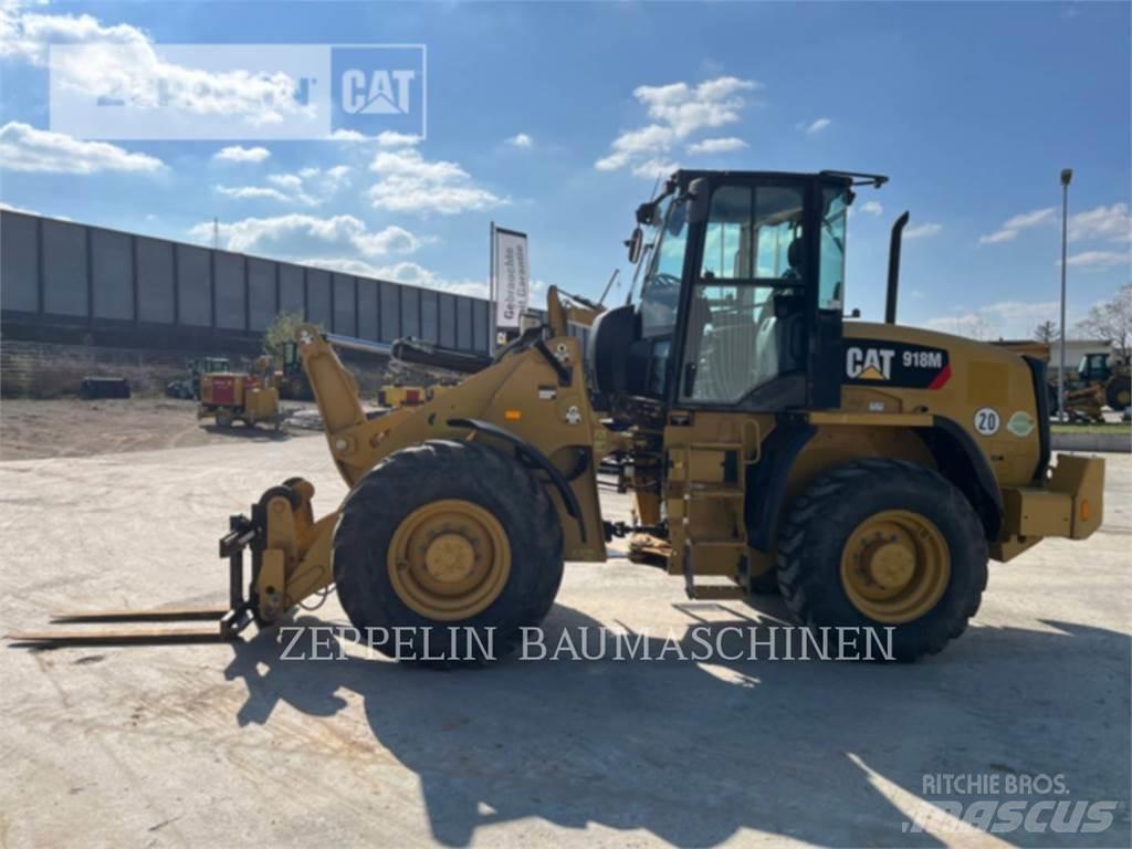 CAT 918M Pale gommate
