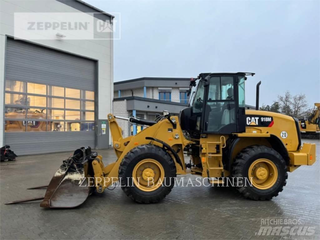 CAT 918M Pale gommate