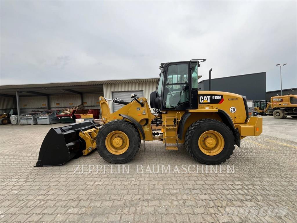 CAT 918M Pale gommate