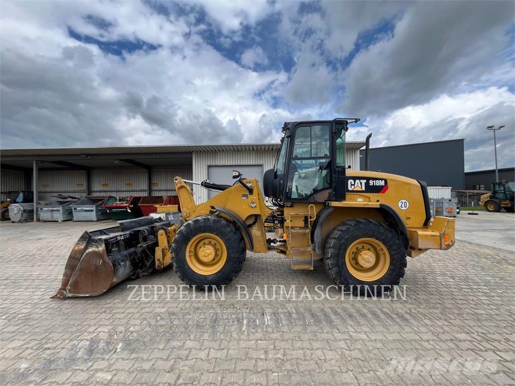 CAT 918M Pale gommate