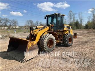 CAT 938G Pale gommate