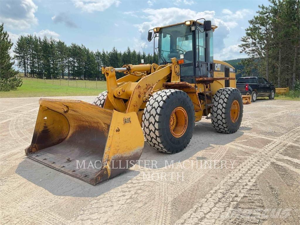 CAT 938G Pale gommate