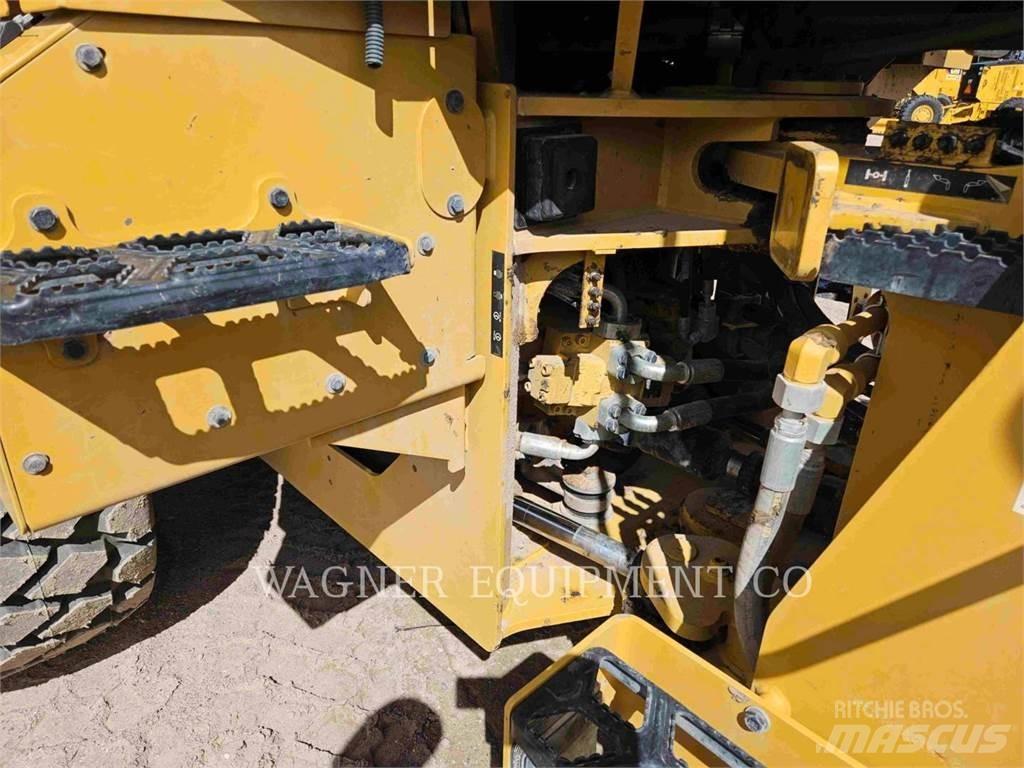CAT 938M Pale gommate