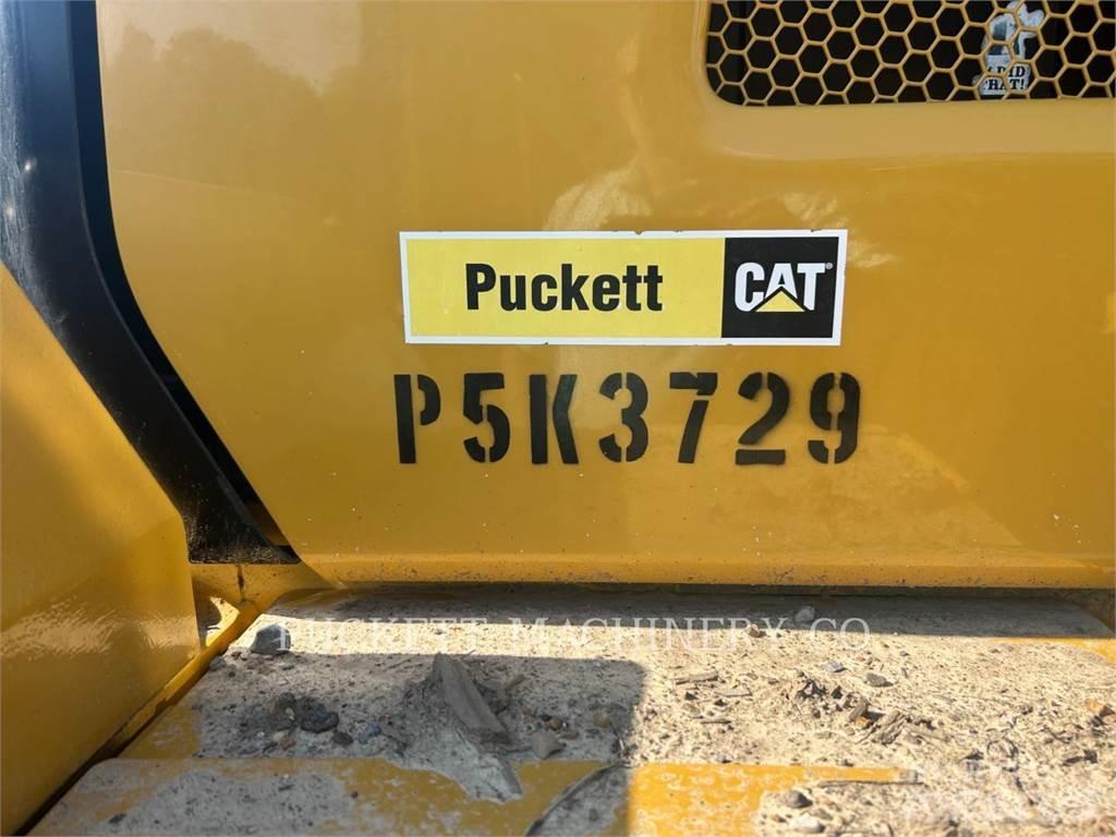 CAT 938M Pale gommate