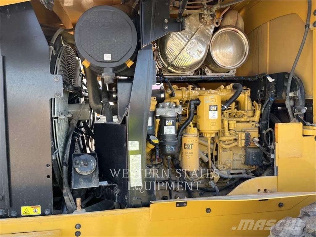 CAT 938M Pale gommate