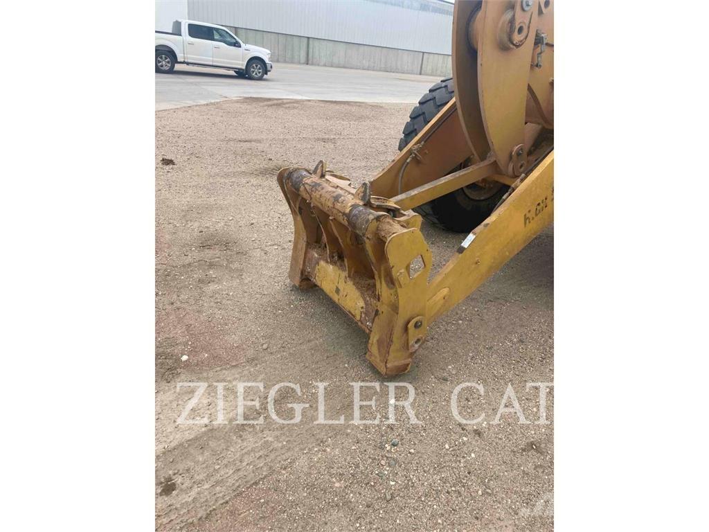 CAT 938M Pale gommate