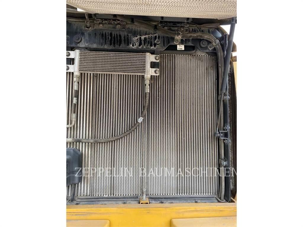 CAT 938M Pale gommate
