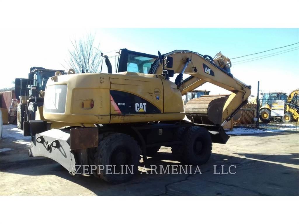 CAT M313D Escavatori gommati