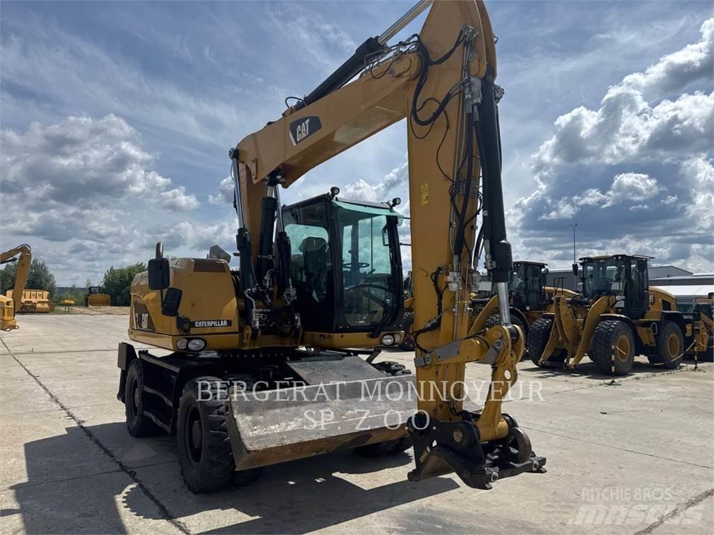 CAT M313D Escavatori gommati