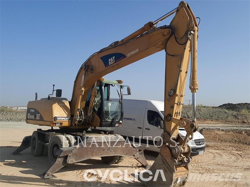 CAT M318 Escavatori gommati