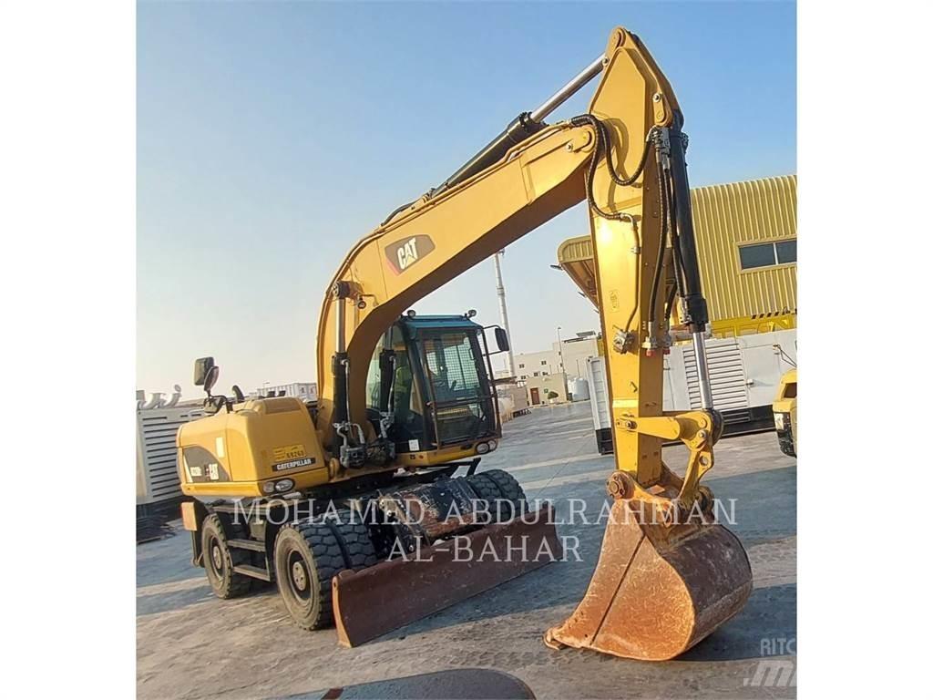 CAT M320D2 Escavatori gommati