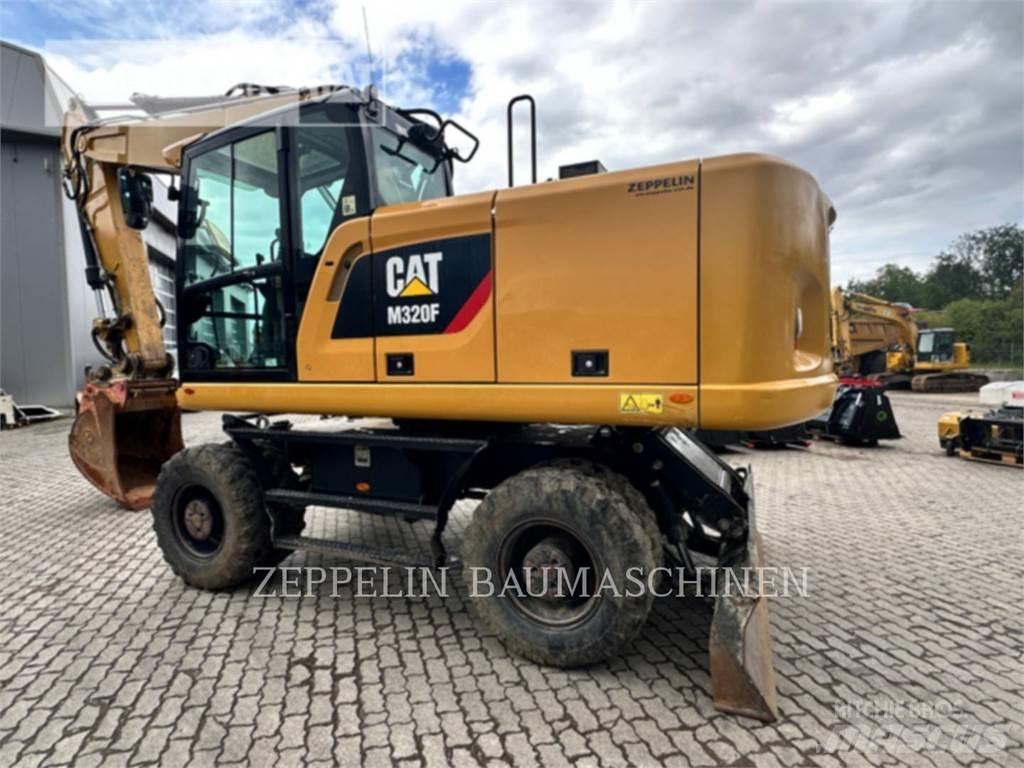 CAT M320F Escavatori gommati