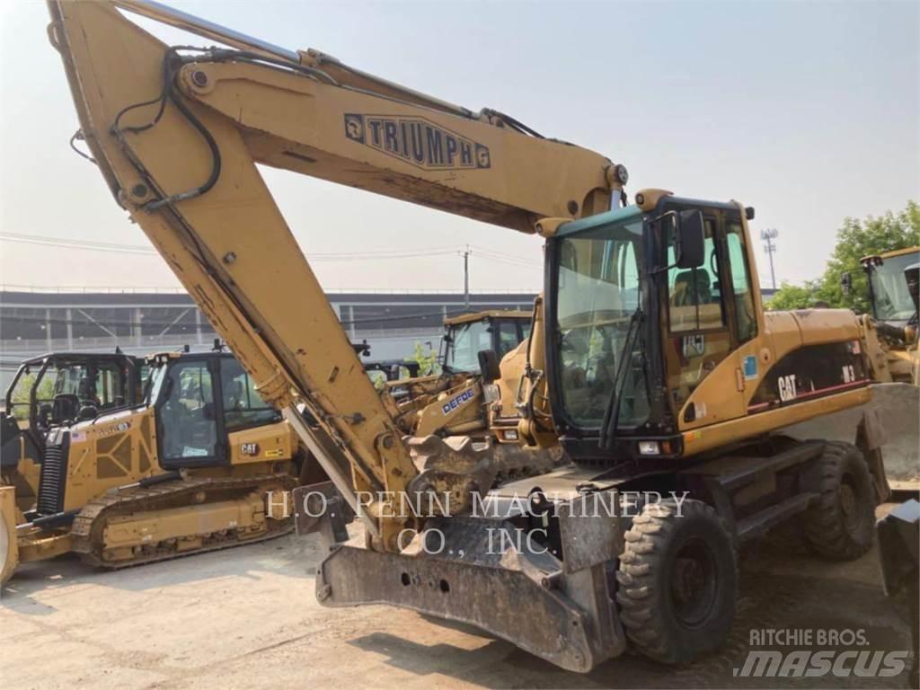 CAT M322C Escavatori gommati