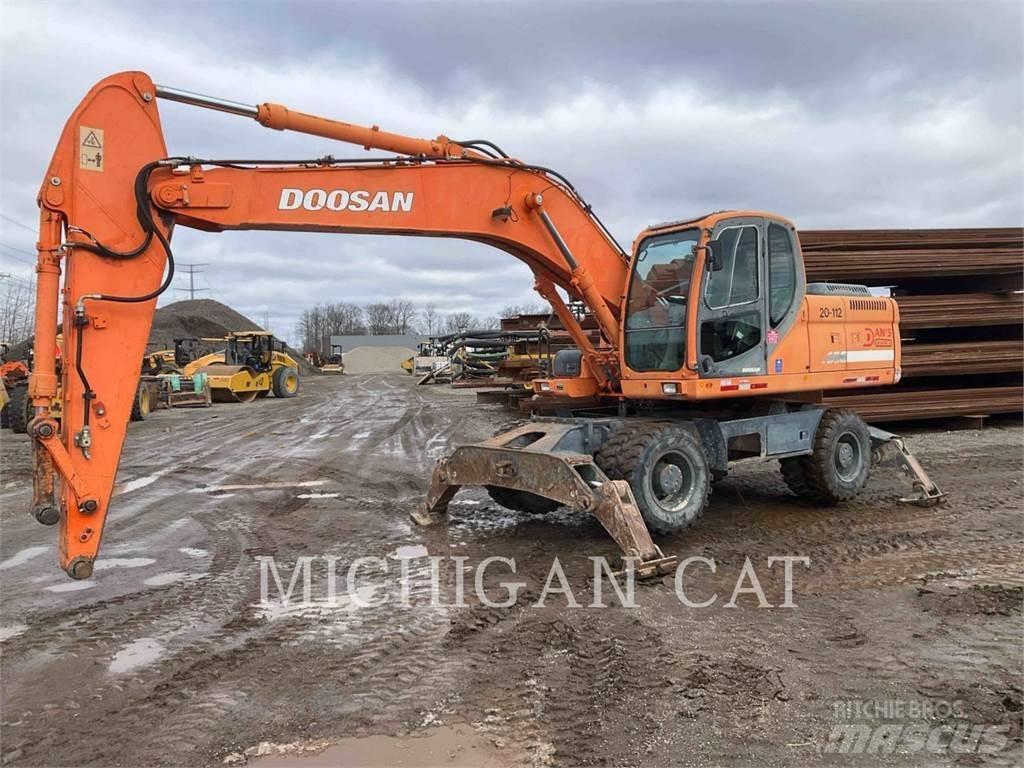 Doosan DX210W Escavatori gommati