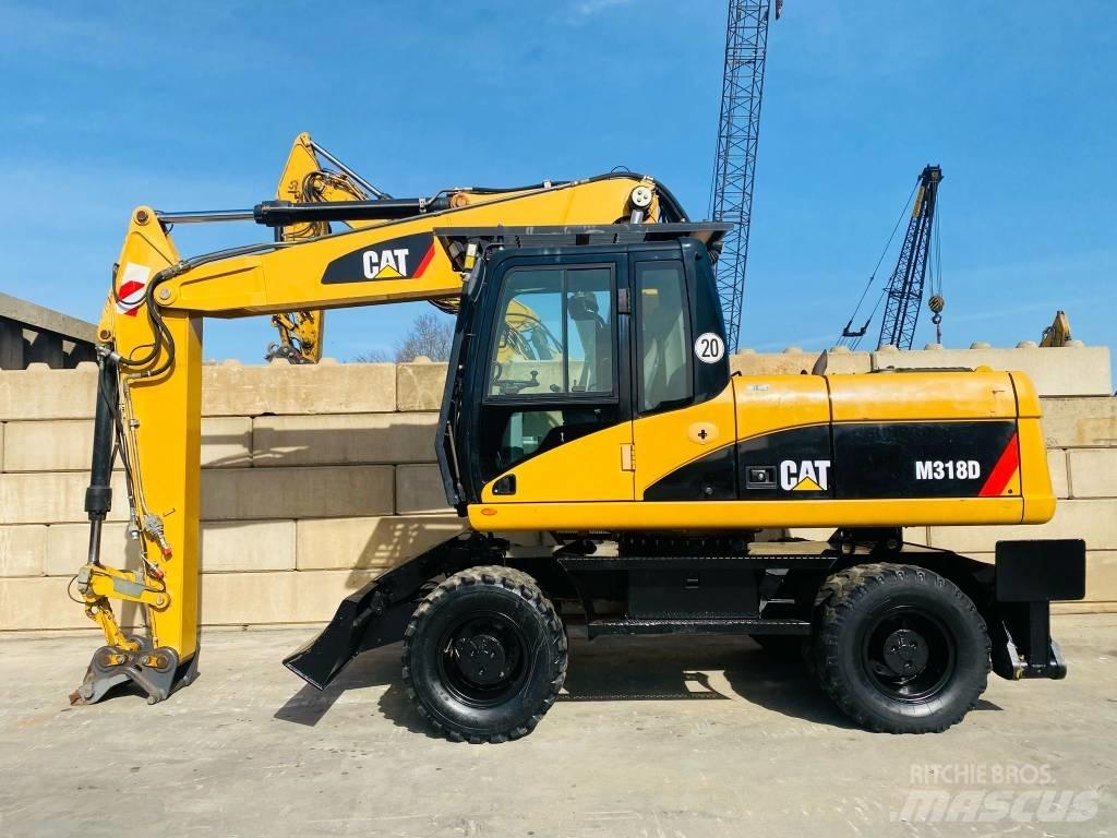 CAT M 318 D Escavatori gommati