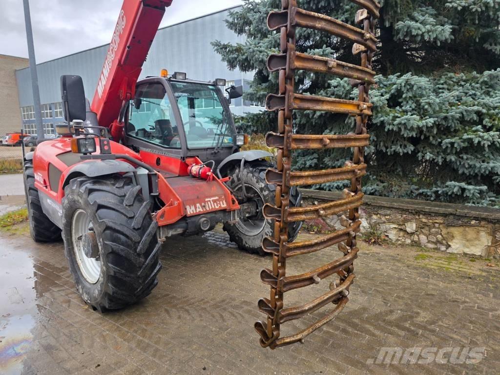 Clark Terra Catene, cingoli e sottocarro