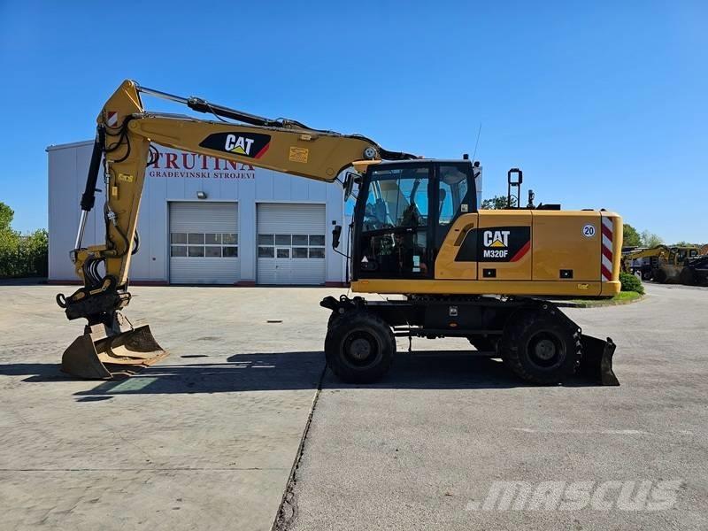 CAT M 320F Escavatori gommati