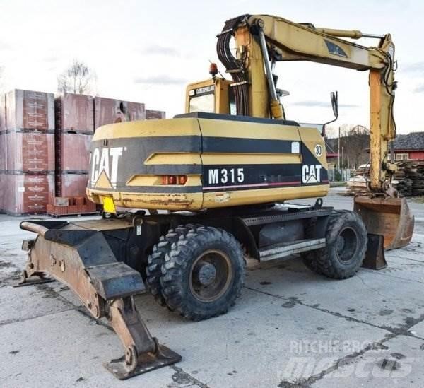 CAT M 315 Escavatori gommati